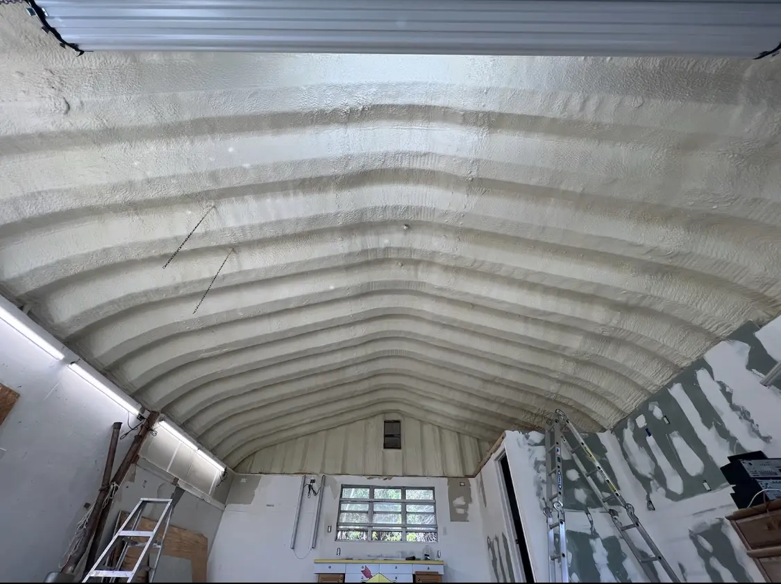 Spray polyurethane foam applied to the underside of a metal roof deck in Cameron Park